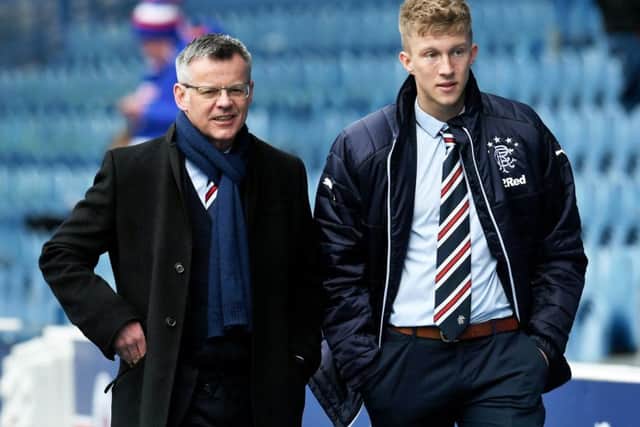 Ross McCrorie, right, with Rangers director Stewart Robertson. Picture: SNS Group