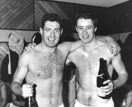 Gavin Hastings and Tony Stanger celebrate Scotland's 
Grand Slam victory in March1990. Picture: Scotsman Publications