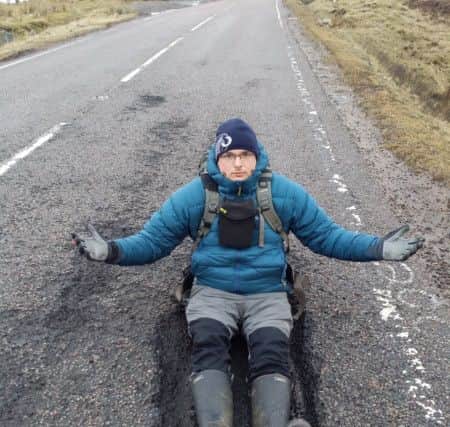 Nick Watson damaged his car on a pothole on the A82 near Bridge of Orchy, Argyll and Bute. Picture: Centre Press