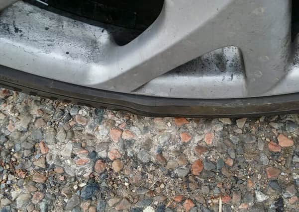 Nick Watson damaged his car on a pothole on the A82 near Bridge of Orchy. Picture: Centre Press