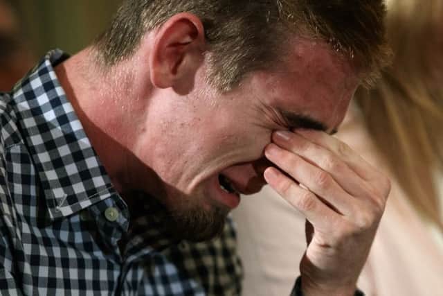 Samuel Zeif, an 18-year-old senior at Marjory Stoneman Douglas High School cries after an emotional speech. (AP Photo/Carolyn Kaster)