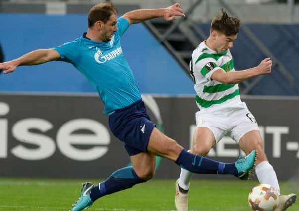 Kieran Tierney tries to force a cross past Branislav Ivanovic. Picture: AFP/Getty