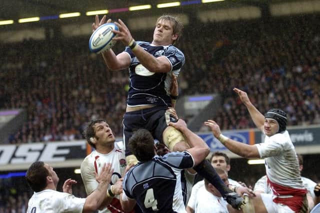 Steve Borthwick, pictured right with scrum cap, experienced defeat at Murrayfield in 2008. Scotland's Scott MacLeod leaps highest to claimed the ball.
Picture: Jane Barlow