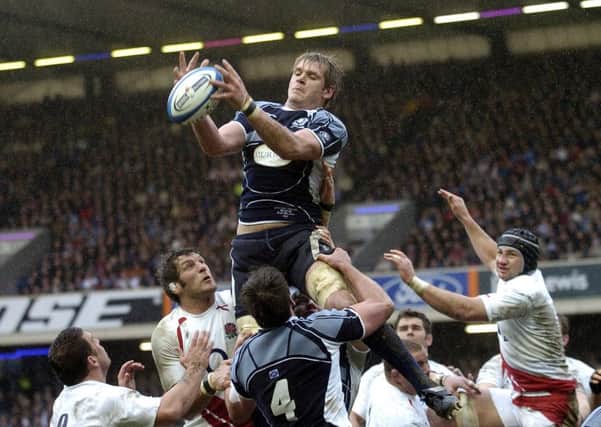 Steve Borthwick, pictured right with scrum cap, experienced defeat at Murrayfield in 2008. Scotland's Scott MacLeod leaps highest to claimed the ball.
Picture: Jane Barlow