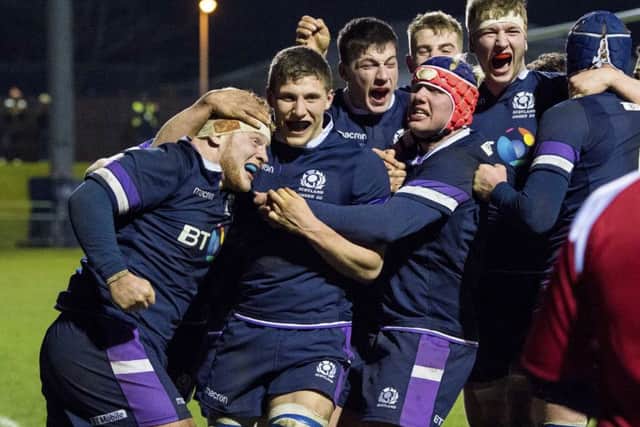 Scotland Under-20 celebrate Finlay Richardson's try in the stunning win over England at Myreside. Picture: Ross Parker/SNS/SRU