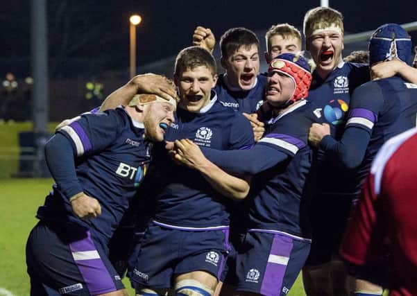 Scotland Under-20 celebrate Finlay Richardson's try in the stunning win over England at Myreside. Picture: Ross Parker/SNS/SRU