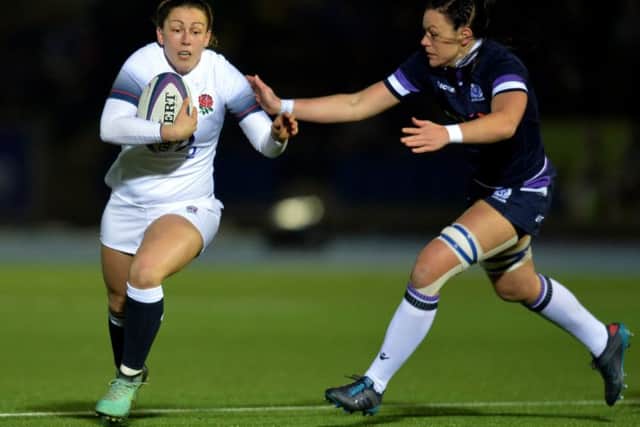 Lauren Cattell of England is tackled by Deborah McCormack of Scotland at Scotstoun. Picture: Mark Runnacles/Getty Images