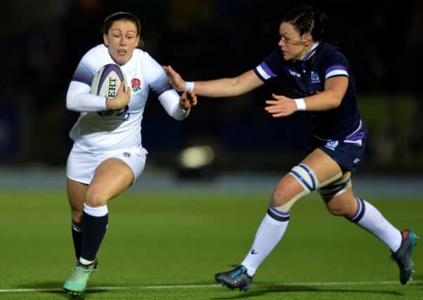 Lauren Cattell of England is tackled by Deborah McCormack of Scotland at Scotstoun. Picture: Mark Runnacles/Getty Images