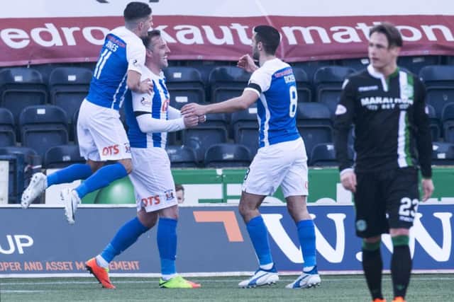 Kris Boyd (centre) celebrates after netting Kilmarnock's second. Picture: SNS Group