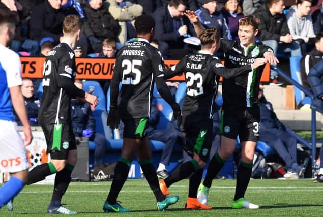 Hibs celebrate Ryan Porteous' goal but it was a game of two halves as Kilmarnock roared back to win a point. Picture: SNS Group