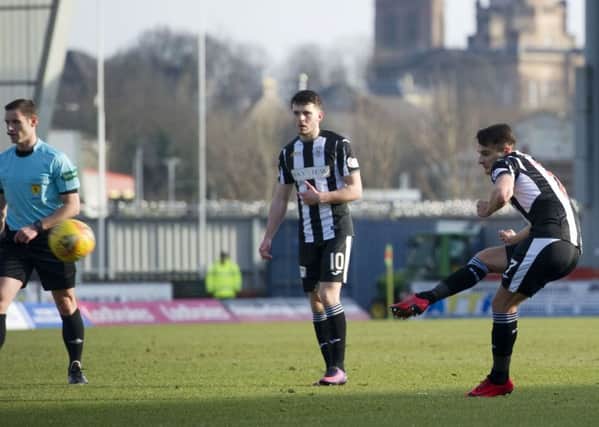 St Mirren's Kyle Magennis' shot is deflected in to the net by Brechin goalkeeper Patrick O'Neil to make it 1-0. Picture: Garry Williamson