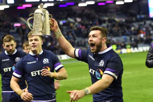 Ryan Wilson celebrates with the Calcutta Cup. Picture: SNS Group