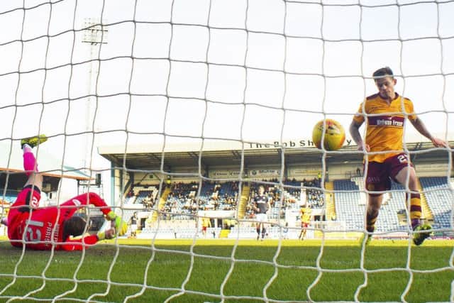 Motherwell's Craig Tanner pounces to score the only goal of the game. Picture: SNS