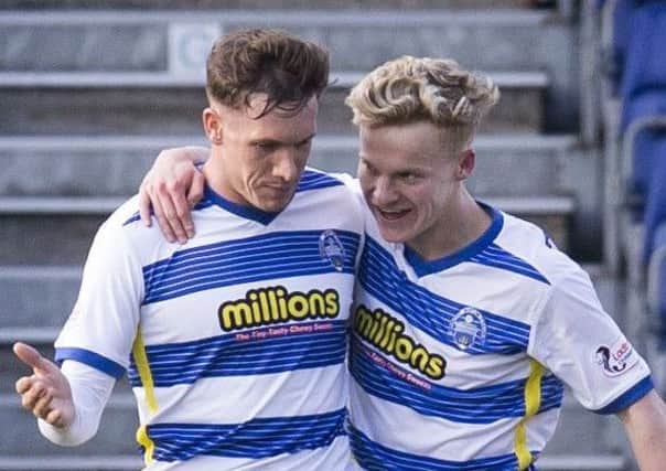 Scott Tiffoney celebrates scoring the opening goal for Morton with Michael Tidser. Picture: Bruce White/SNS