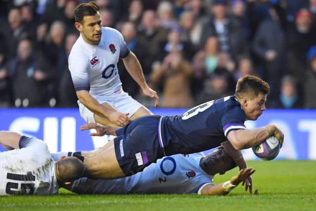 Huw Jones dives over for his second try in Scotland's stunning win over England. Picture: Gary Hutchison/SNS/SRU
