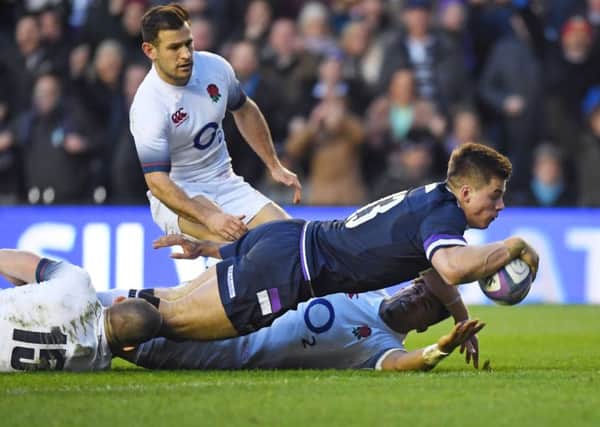 Huw Jones dives over for his second try in Scotland's stunning win over England. Picture: Gary Hutchison/SNS/SRU