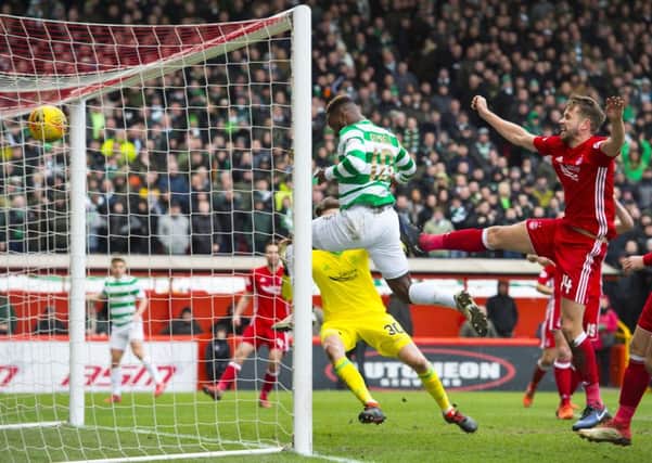 Moussa Dembele scores to give Celtic the lead against Aberdeen at Pittodrie. Picture: SNS.