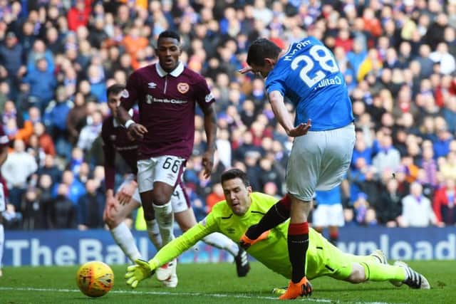 Jamie Murphy opens the scoring for Rangers against Hearts on Saturday. Picture: SNS.