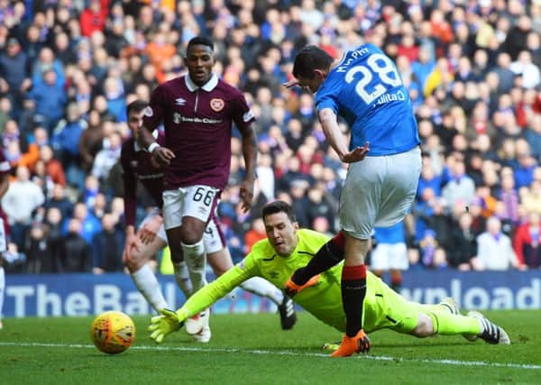 Jamie Murphy opens the scoring for Rangers against Hearts on Saturday. Picture: SNS.