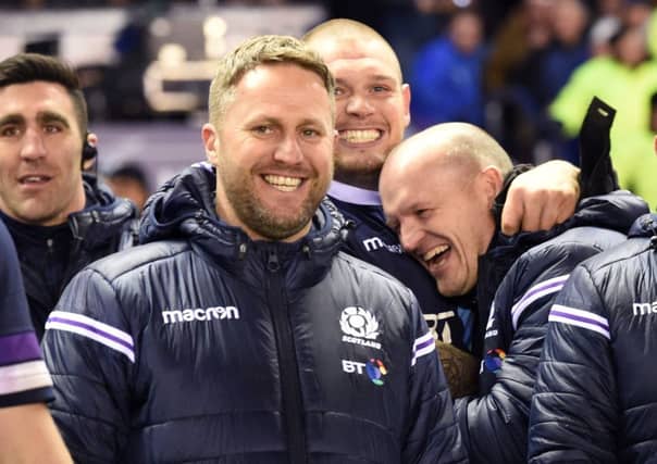 Gordon Reid celebrates the Murrayfield win with Gregor Townsend. Picture: SNS/SRU.