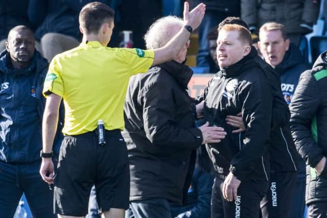 Neil Lennon, right, is sent to the stands by referee Kevin Clancy during Hibs' 2-2 draw with Kilmarnock. Picture: SNS
