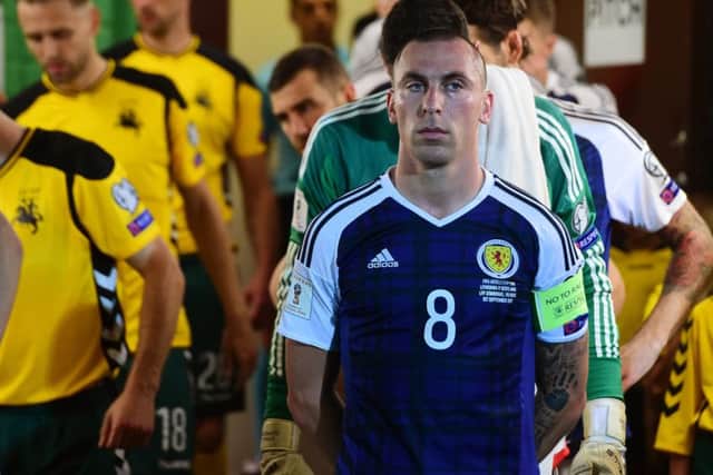 In a pose so familiar to many Scottish football supporters, a steely-eyed Scott Brown prepares to lead the national team into battle in a World Cup qualifying match against Lithuania in September 2017.