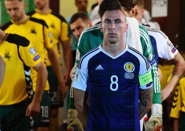 In a pose so familiar to many Scottish football supporters, a steely-eyed Scott Brown prepares to lead the national team into battle in a World Cup qualifying match against Lithuania in September 2017.