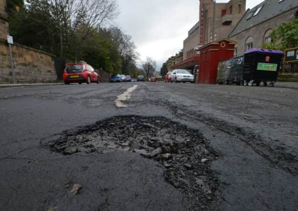 Recycled plastic bottles and other waste could be used to fill potholes