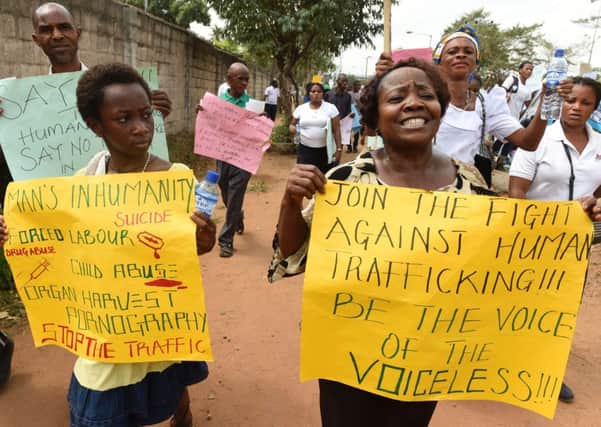 Women march against the illegal human trafficking and violence in Lagos (Picture: AFP/Getty Images)