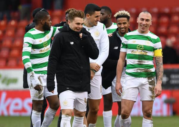 James Forrest and Scott Brown helped Celtic move 12 points clear of Aberdeen on Sunday. Picture: Craig Foy/SNS