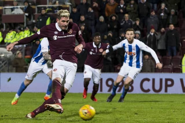 Kyle Lafferty squanders Hearts 
spot-kick in time added on,  Kilmarnocks former Tynecastle keeper Jamie MacDonald denying the striker.