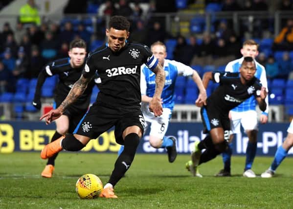 James Tavernier tucks away a penalty to make it 1-0. Picture: SNS Group
