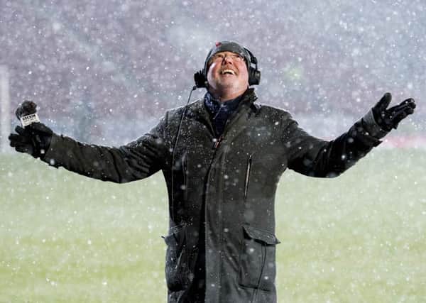 BBC reporter Chick Young in the snow before St Johnstone v Rangers on Tuesday. Picture: SNS