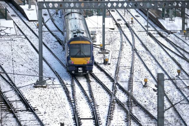 A ScotRail train leaves Edinburgh's Waverley Station. The service is halting many trains on the network from 2. Picture; PA