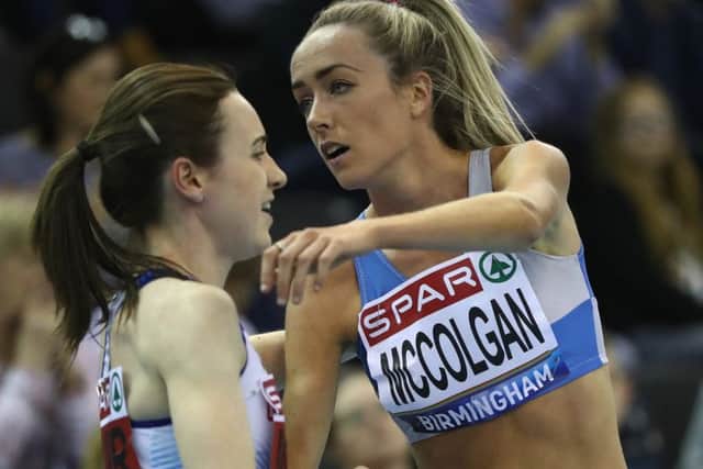 Eilish McColgan congratulates Laura Muir, left, on her 3,000m win at the British indoors. Picture: Michael Steele/Getty
