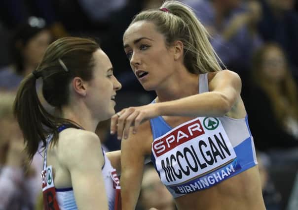 Eilish McColgan congratulates Laura Muir, left, on her 3,000m win at the British indoors. Picture: Michael Steele/Getty