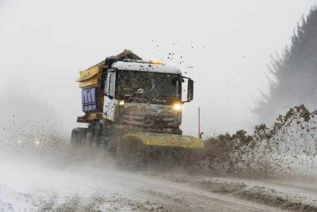 Snow Plough working hard to keep the A68 at Soutra Hill open during blizzard conditions.Picture: Ian Rutherford