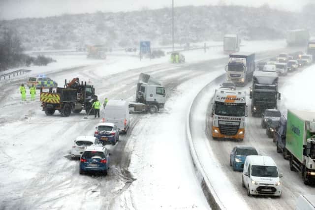 A jackknifed lorry on the M80 Haggs in Glasgow. Police Scotland's control centre has received 50 per cent more calls than normal to 999. Picture: Andrew Milligan/PA Wire