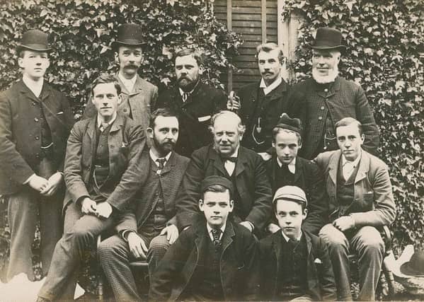 The staff of Russel + Aitken captured for posterity in the pioneering years of photography