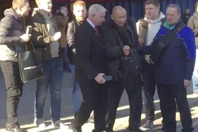 A screenshot from the video shows Jones, and four Scotland fans. Picture: Twitter/DanRoan