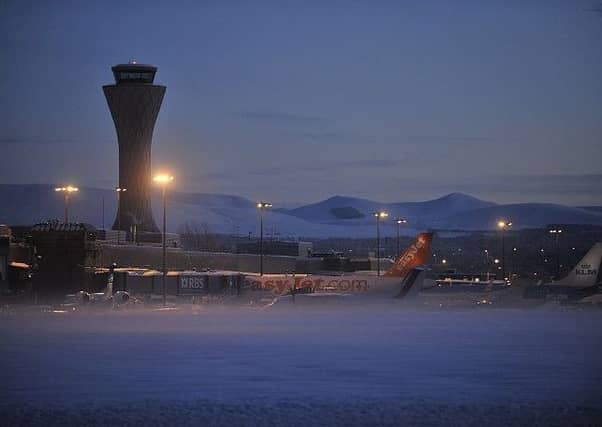 Edinburgh Airport: Many flights have been cancelled due to the weather. Picture: TSPL