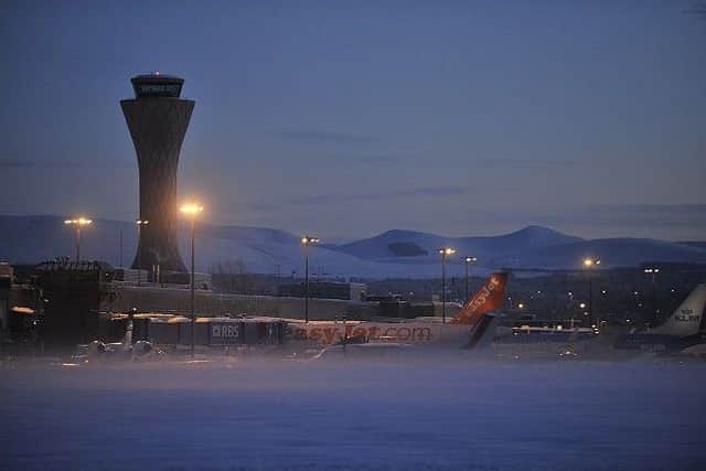 Edinburgh Airport: Many flights have been cancelled due to the weather. Picture: TSPL