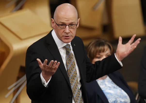 Deputy First Minister John Swinney was over the top with advice to stay off the road unless it was an emergency (Picture: PA)