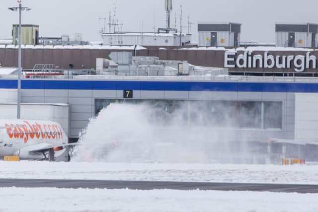 Edinburgh Airport was disrupted by 'the Beast from the East' a few weeks ago (pictured) Photo: SWNS