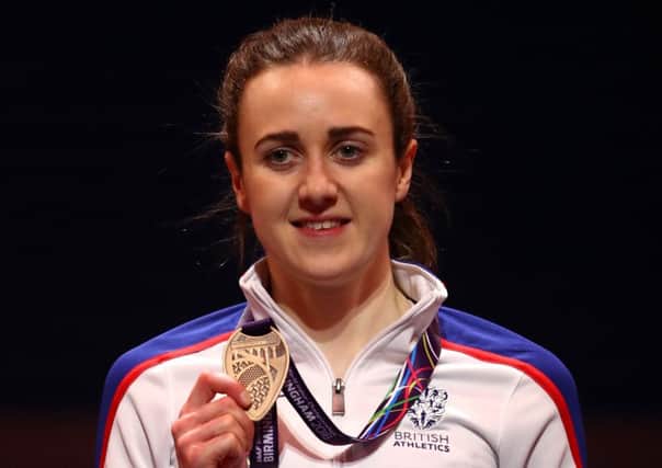 Laura Muir celebrates winning bronze in the 3000 metres at the IAAF world indoor championships in Birmingham.  Picture: Michael Steele/Getty Images for IAAF
