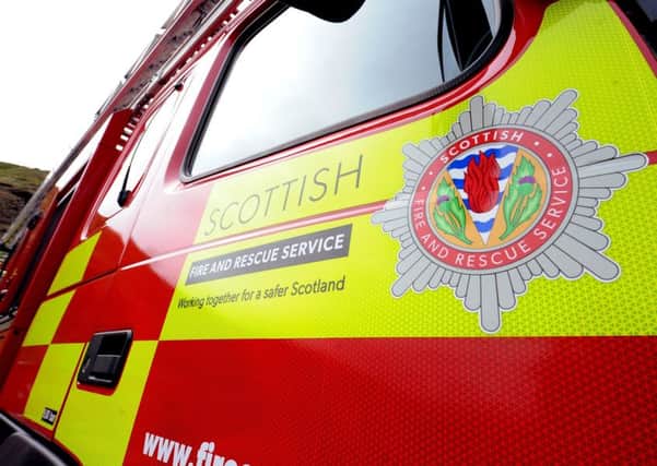 Firefighters are tackling a large blaze at a Barrhead business