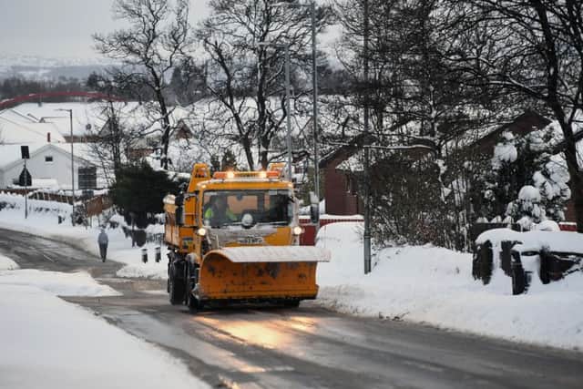 A snowplough clears the road in Balloch. Picture: Getty
