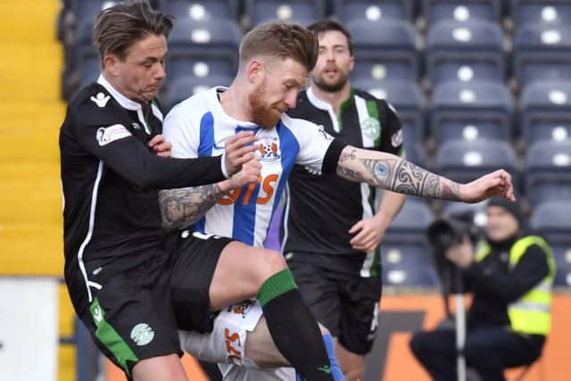 Kilmarnock's Alan Power (right) battles with Hibs midfielder Scott Allan. Picture: SNS