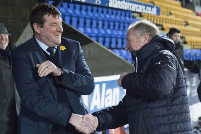 St Johnstone manager Tommy Wright (left) shakes hands with Rangers assistant manager Jimmy Nicholl. Picture: SNS