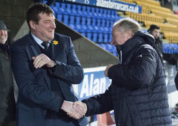 St Johnstone manager Tommy Wright (left) shakes hands with Rangers assistant manager Jimmy Nicholl. Picture: SNS
